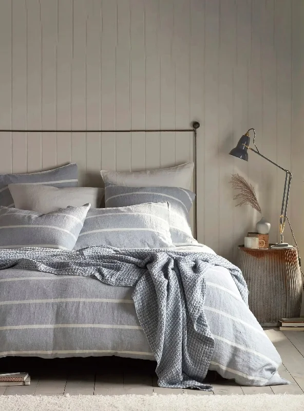 Patchwork duvet covers with a variety of fabric pieces sewn together for a rustic charmBlue Seb Stripe Cotton Linen Bed Linen