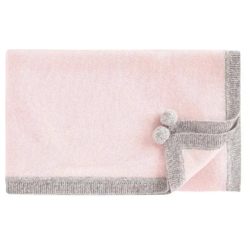 Fleece blankets for a cozy and plush textureCashmere pompoms blanket pink