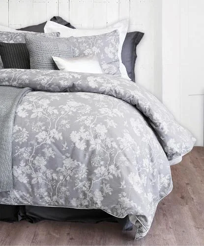 Solid - colored duvet covers in classic colors like white, black, and navy for a timeless lookDUVET COVER / BROGAN