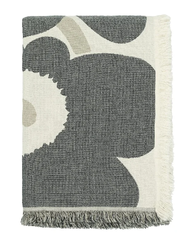 Cotton blankets for breathability and a lightweight feelMarimekko Unikko Jacquard Throw