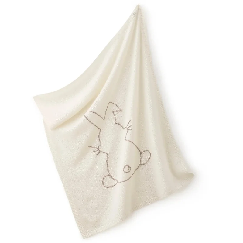 Linen blankets with a rustic and textured lookCashmere bunny embroidered cream blanket