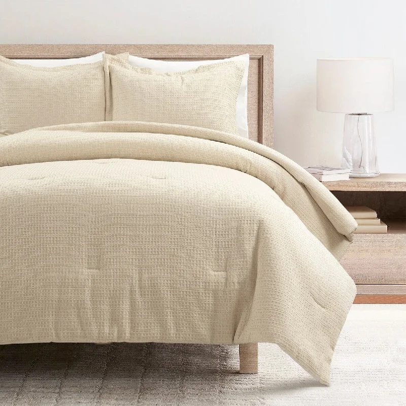 Microfiber - filled comforters that are lightweight and easy to care forLush Decor Haniya Solid Waffle Woven Cotton Textured Comforter Set