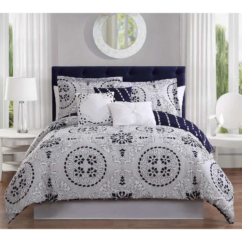 Down - filled comforters for supreme warmth and lightnessStudio 17 Bailey 7-Piece Reversible Comforter Set